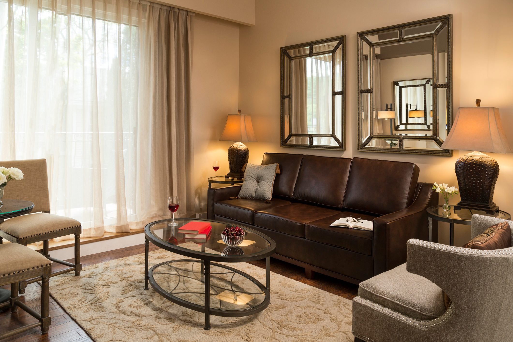 Living Room with Leather sofa and mirrors