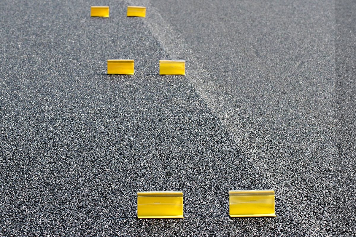 Yellow Tags in the Road? Here’s What They Mean